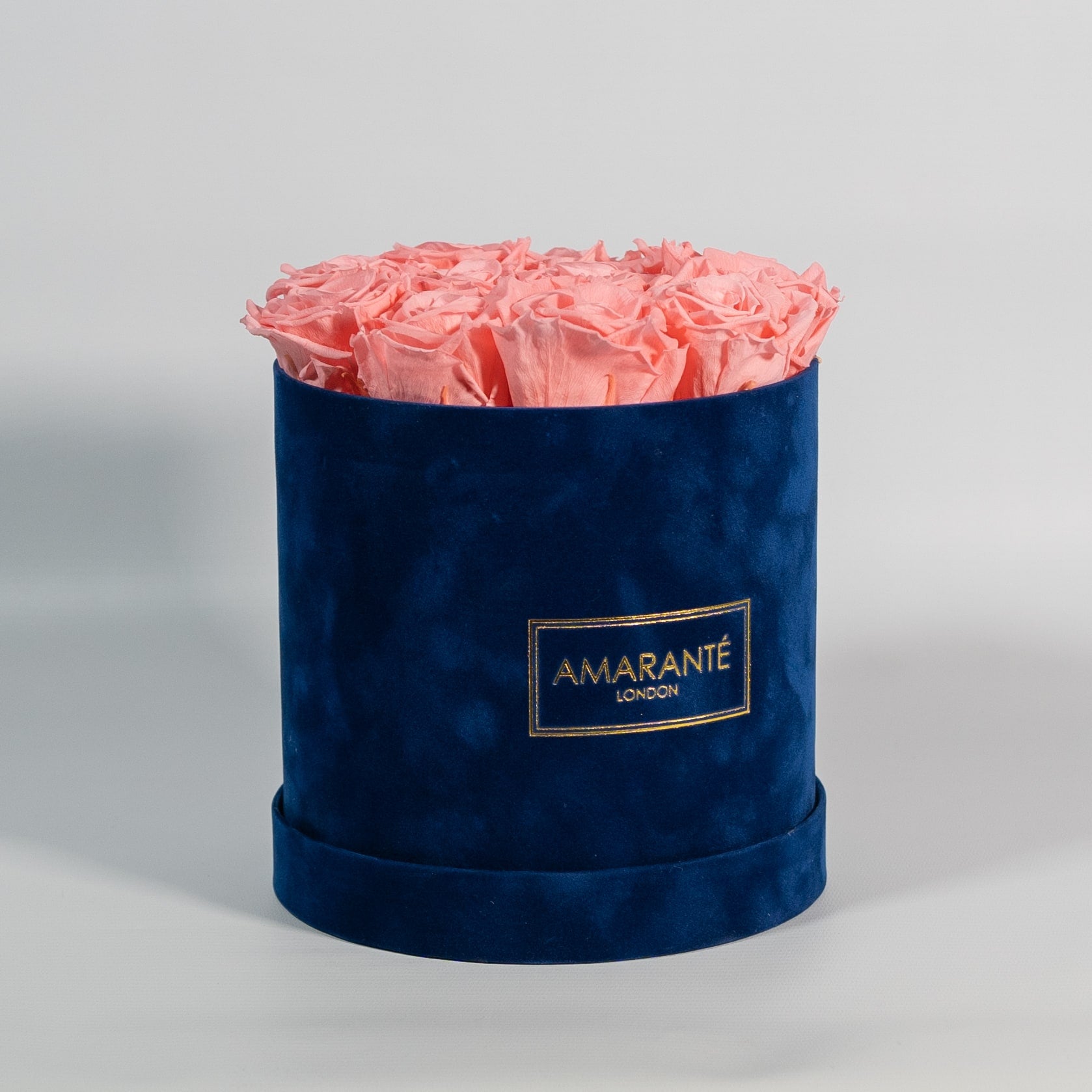 Tender light pink Roses featured in a stunning blue box 