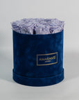 Artful lavender Roses entrenched in an enchanting blue box 