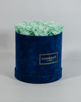 Revitalising mint green Roses comprised in a trendy blue box