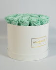 revitalsing mint green roses featured in a chic white large box 