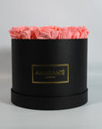 Tender light pink Roses available in a large round hatbox 