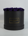 Captivating dark purple Roses for an older sibling, expressing wisdom, protection, and security. 