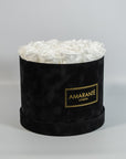 Charming white Roses in a dapper black large box 