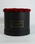 Aromatic wine red Roses featured in a modern black box