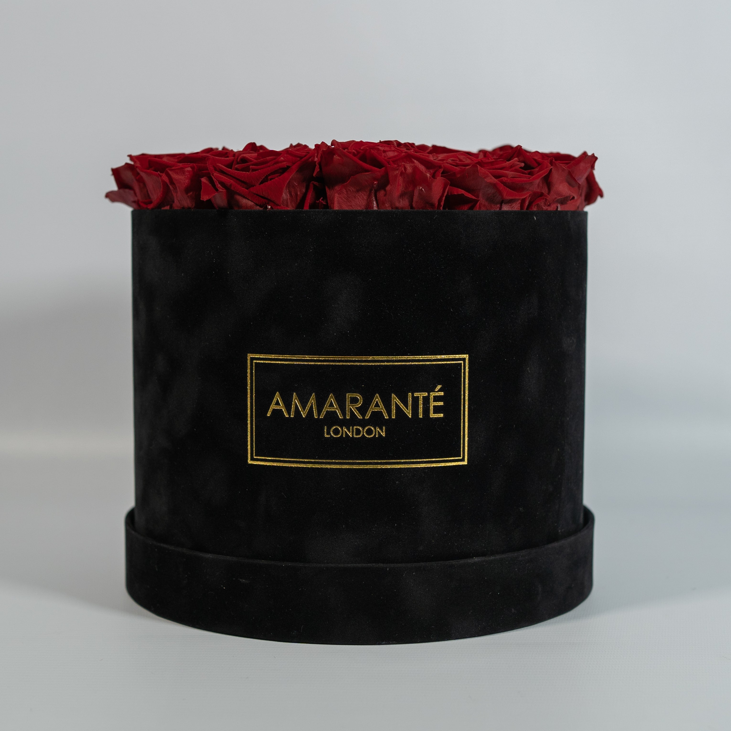 Divine wine red Roses in a polished black box 