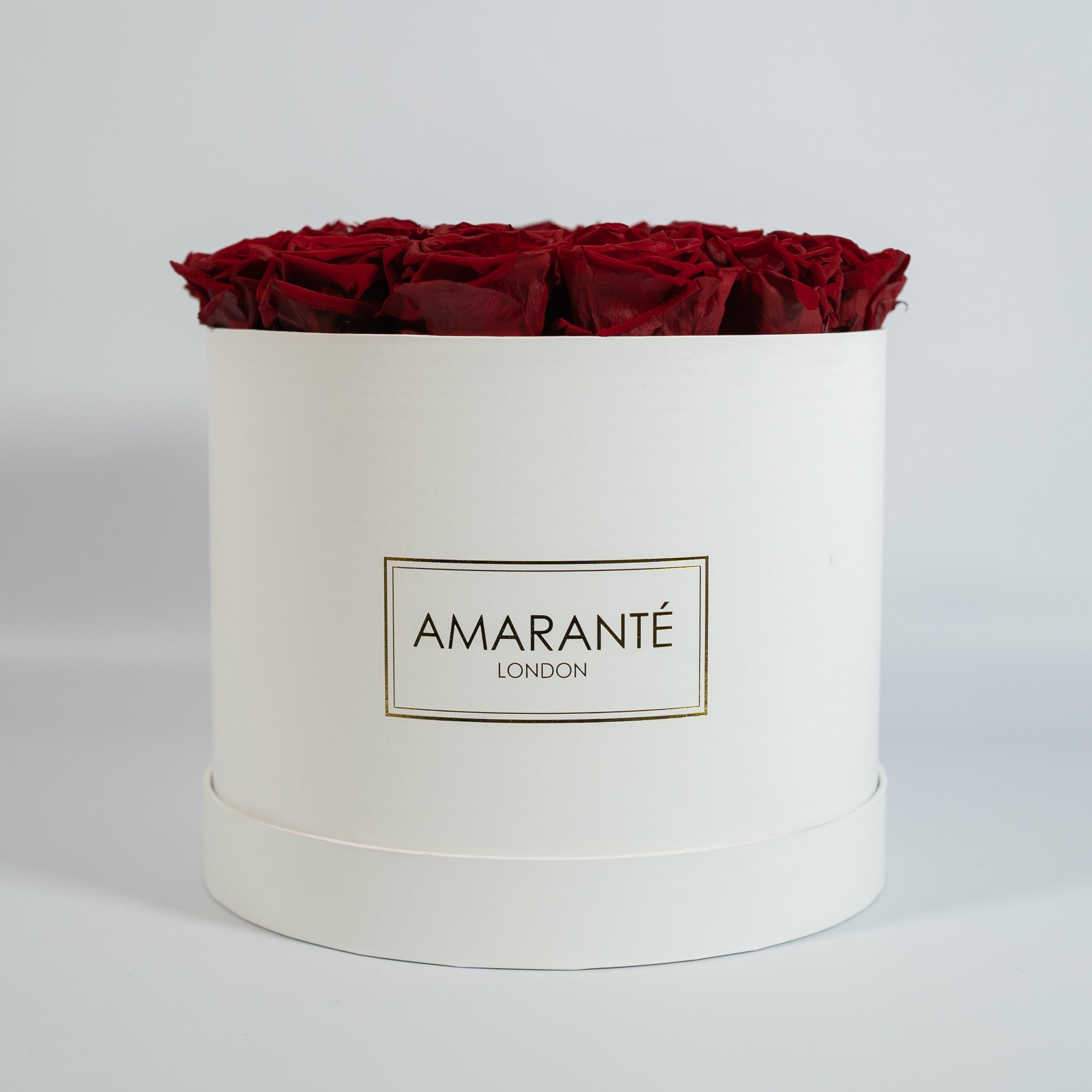 Dreamy wine red Roses manifested in a gorgeous white box 