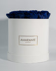 Extravagant royal blue roses connoting luxury, and protection. 