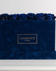 Gorgeous dark blue Roses, denoting expertise, depth, and stability.  