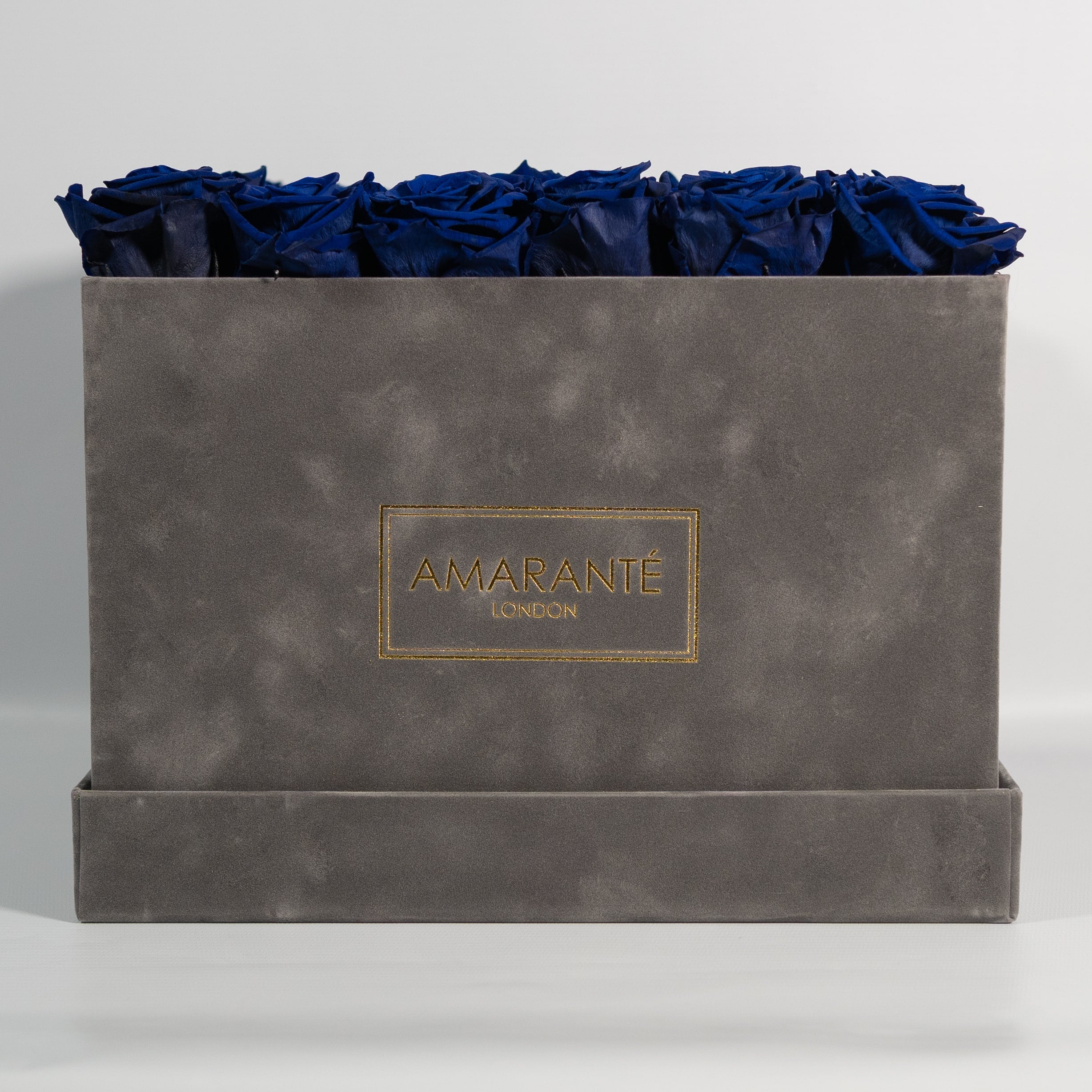 Luxurious royal blue Roses in an elegant grey box 