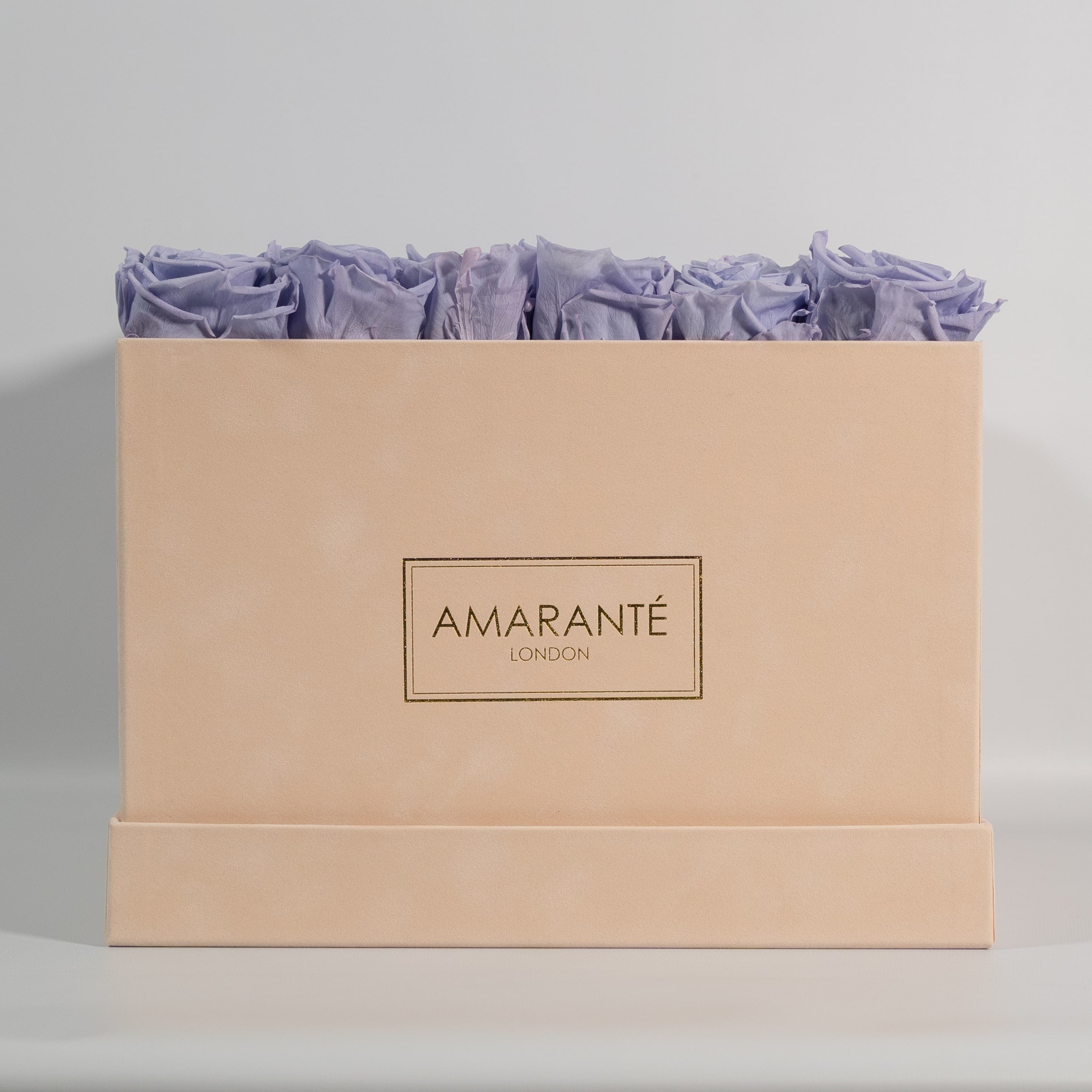 Idyllic Lavender Roses in a stylish extra large box. 