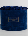 Monochromatic dark blue roses in a stylish dark blue box, imbued with luxurious colours. 