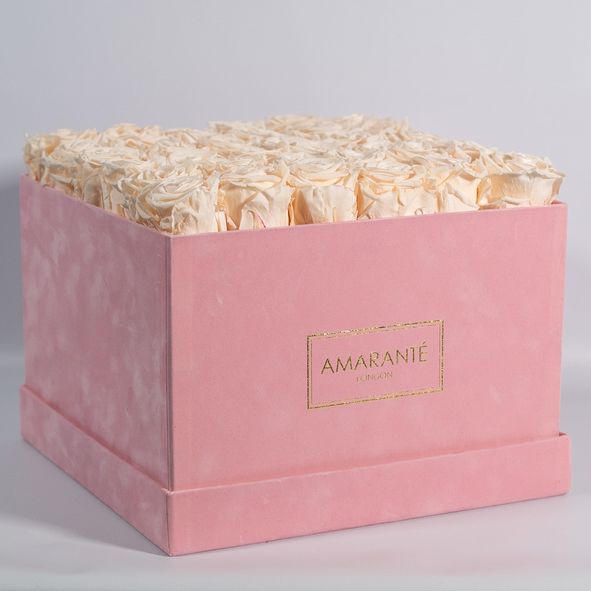 Exciting champagne roses included in a delicate pink box 