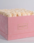 Exciting champagne roses included in a delicate pink box 