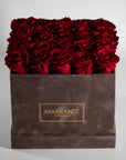 Divine wine red Roses in a dapper grey package 