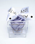 Stylish transparent acrylic box with a single infinity rose in a delicate lavender colour, decorated with elegant white ribbon, for timeless memories of romance to celebrate special occasions - Free UK Delivery!