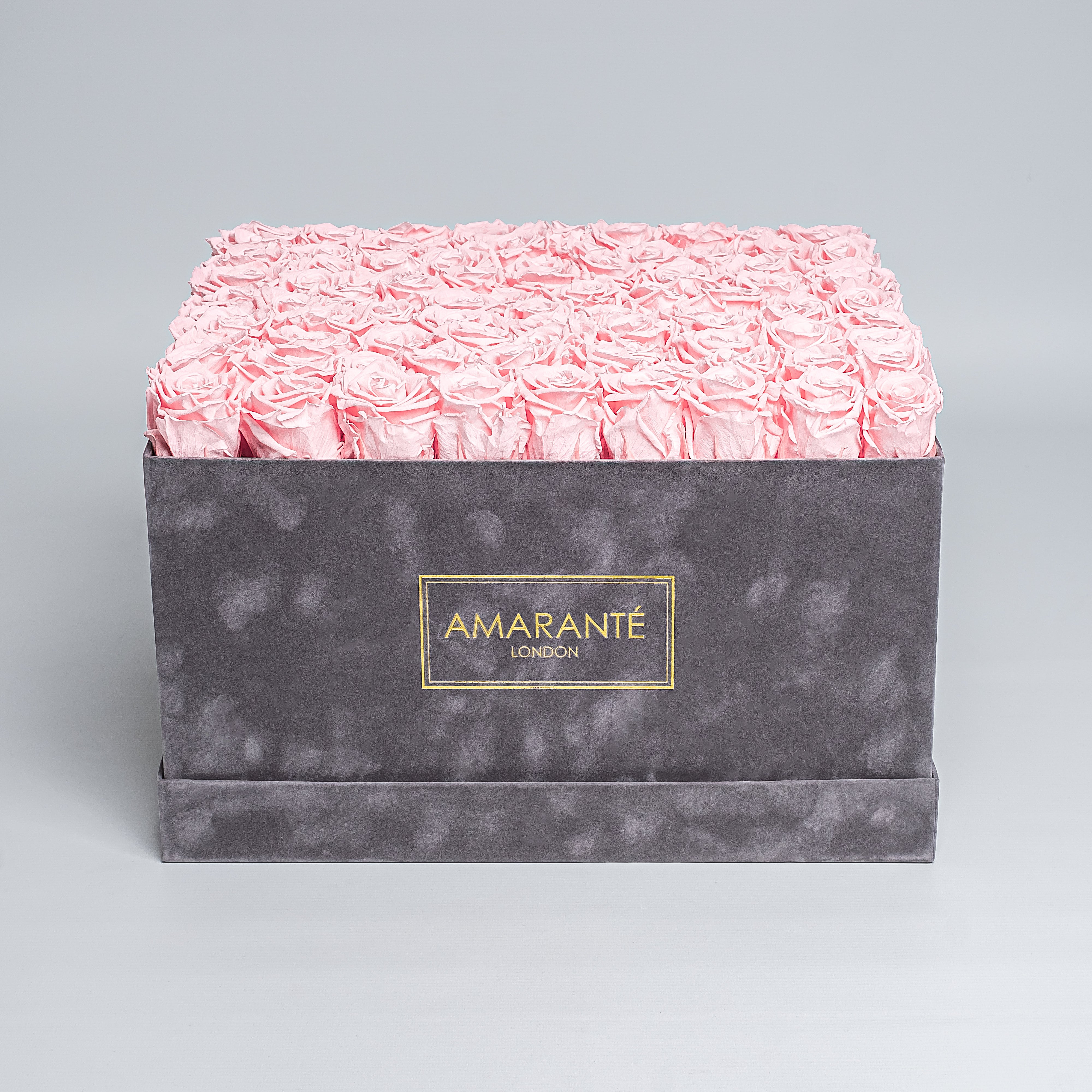 Experience elegance with our 16&quot;x16&quot; extra large grey hatbox, filled with large light-pink forever roses. A luxurious gift of love with free UK delivery, roses customisable in 14 pastel tones.