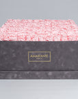 Luxurious super deluxe grey square rose box with a chic suede finish, brimming with 150 large pink infinity roses, a timeless expression of love, free UK delivery, 20"x20" rose box - Choose your roses from 14 delicate pastel colours.