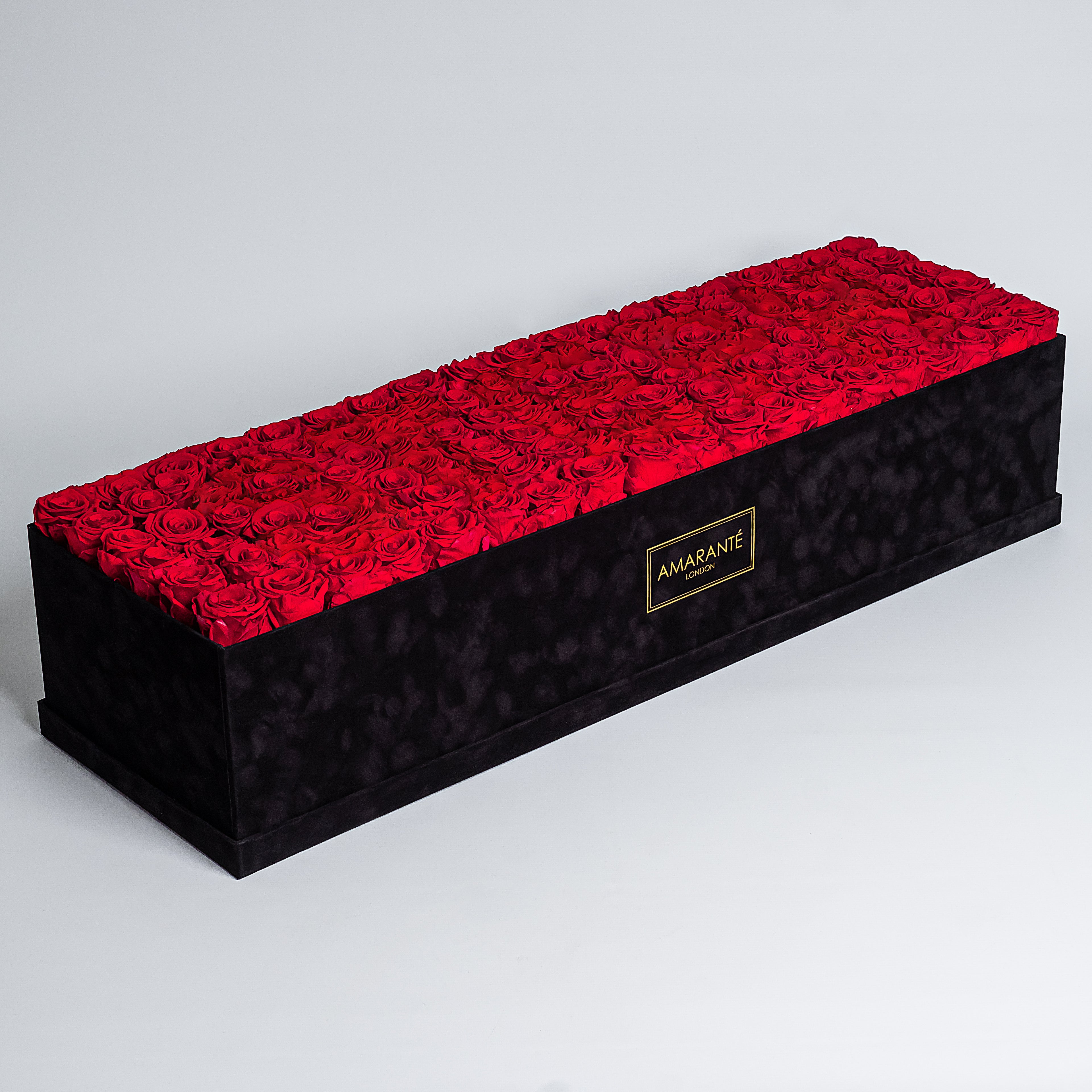 Sophisticated super deluxe black rectangular suede rose box, elegantly filled with 140 pink infinity roses, epitome of timeless love. Free UK delivery, 30&quot;x25&quot;, luxury rose box customisable with roses in 14 delicate pastel shades.