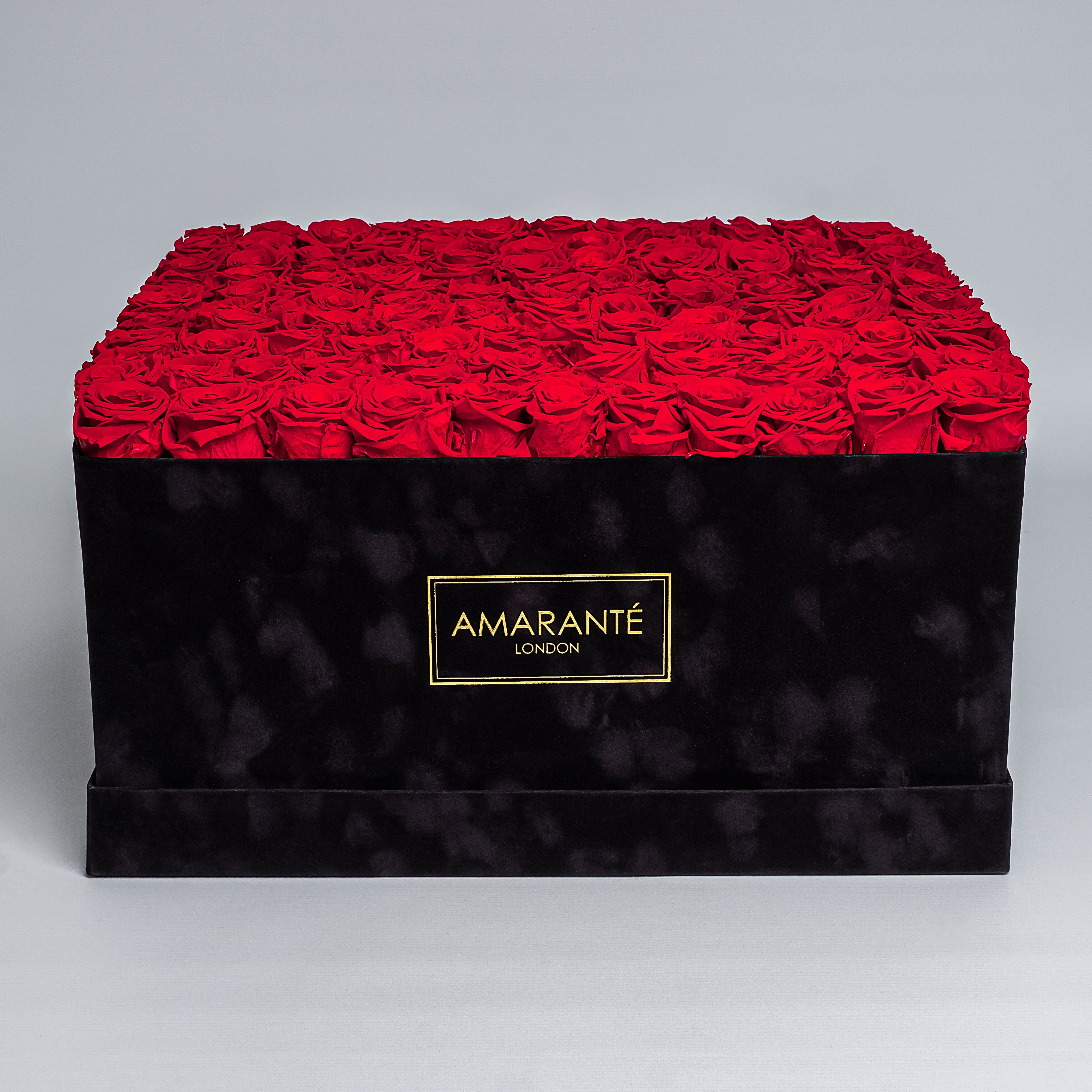 Elegant super deluxe black 20&quot;x20&quot; square hatbox containing 150 large red forever roses, 2-3 inches wide, available in 14 customisable colours.