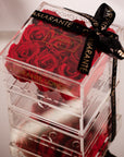 Nine stunning red Roses featured in a classic acrylic box 