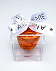 Orange single infinity rose in an enchanting transparent acrylic box, dressed with a delicate white ribbon - the perfect gift for Valentine's Day and other memorable romantic events.