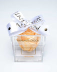 Peach Infinity Rose in refined acrylic transparent box decorated with a white ribbon for the ultimate romanic experience.