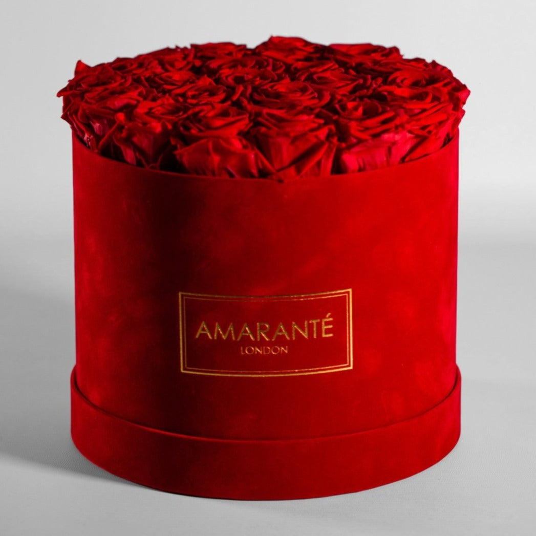 Alluring red Roses in a divine red suede hatbox