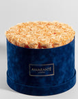 Warm peach roses in a dreamy blue box, the perfect gift to express friendship and appreciation. 