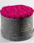 Distinctive dark pink Roses in a delicate grey box, perfect for a girlfriend