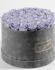 Captivating Lavender Roses accessible in a stylish grey box