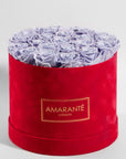 Fragrant lavender Roses imbedded in a magical red box