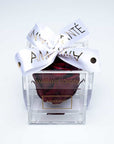 Luxurious deep red single infinity rose in an acrylic box dressed with stylish white ribbon, a perfect Valentine's Day gift.
