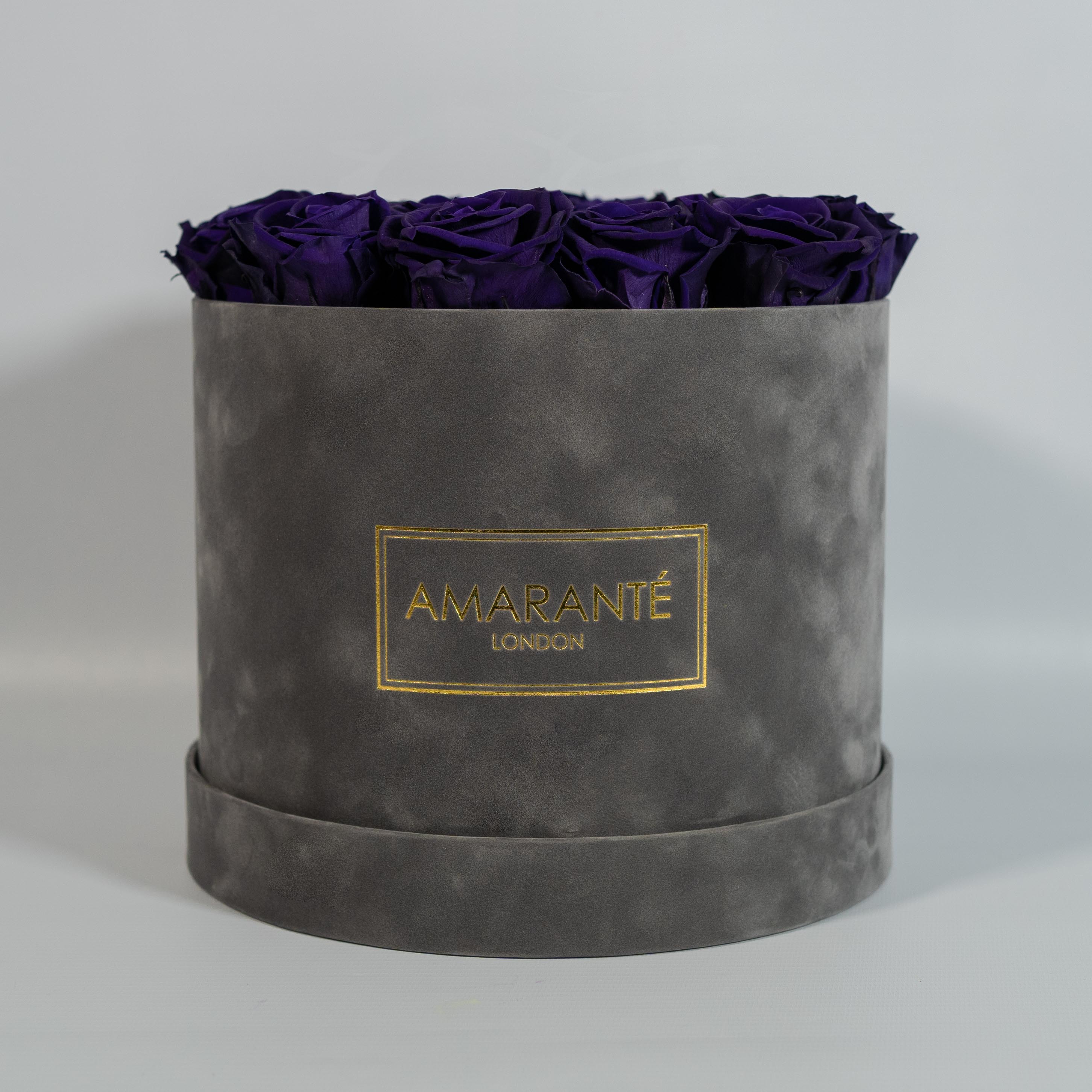 Blossom-filled dark purple Roses denoting wisdom, creativity, and magic.