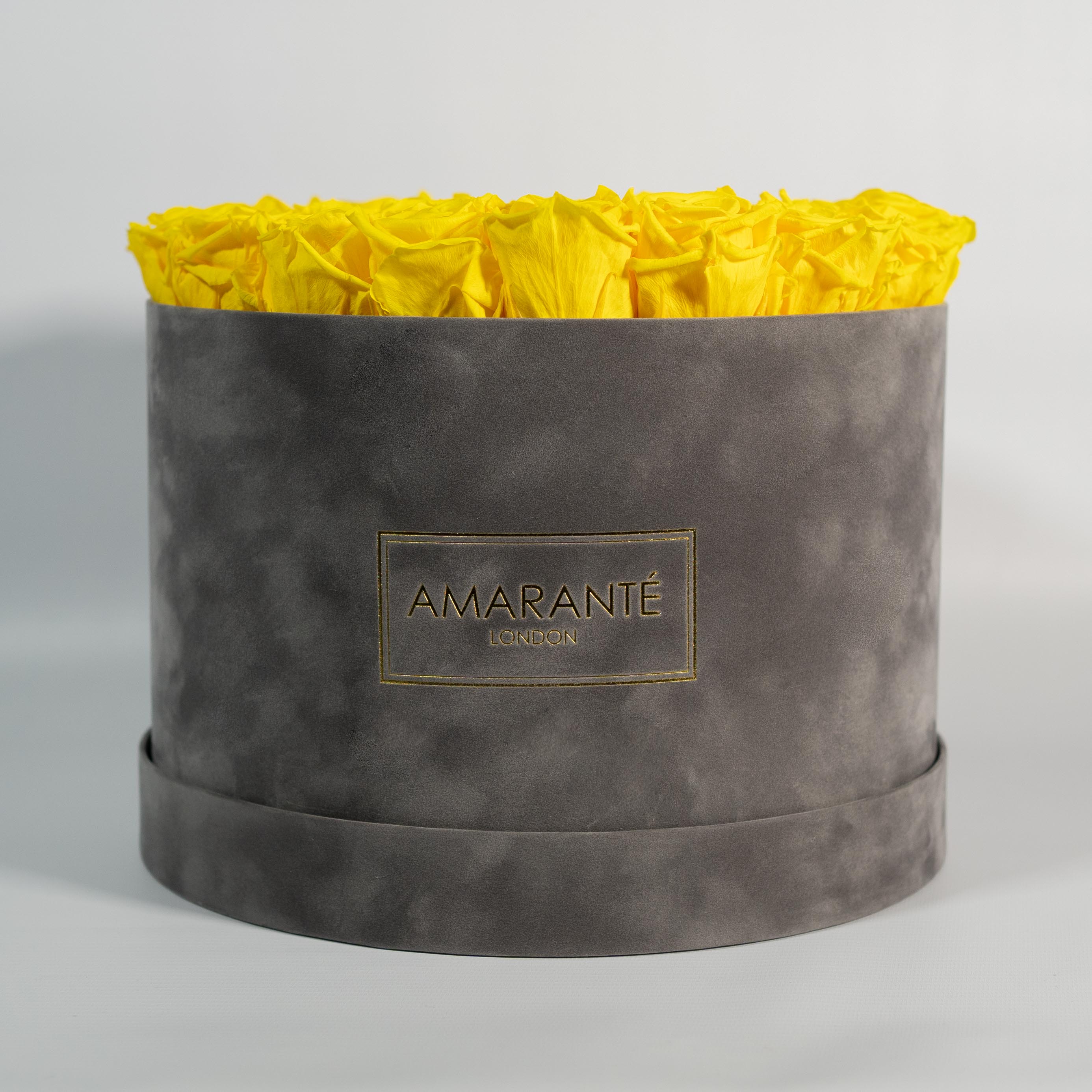 Magical yellow Roses in a dapper ash coloured box