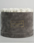 Glorious white Roses in a draemy grey extra large box, ideal for denoting faithfulness. 