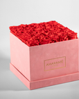 Stunning hot pink roses in an elegant pink box