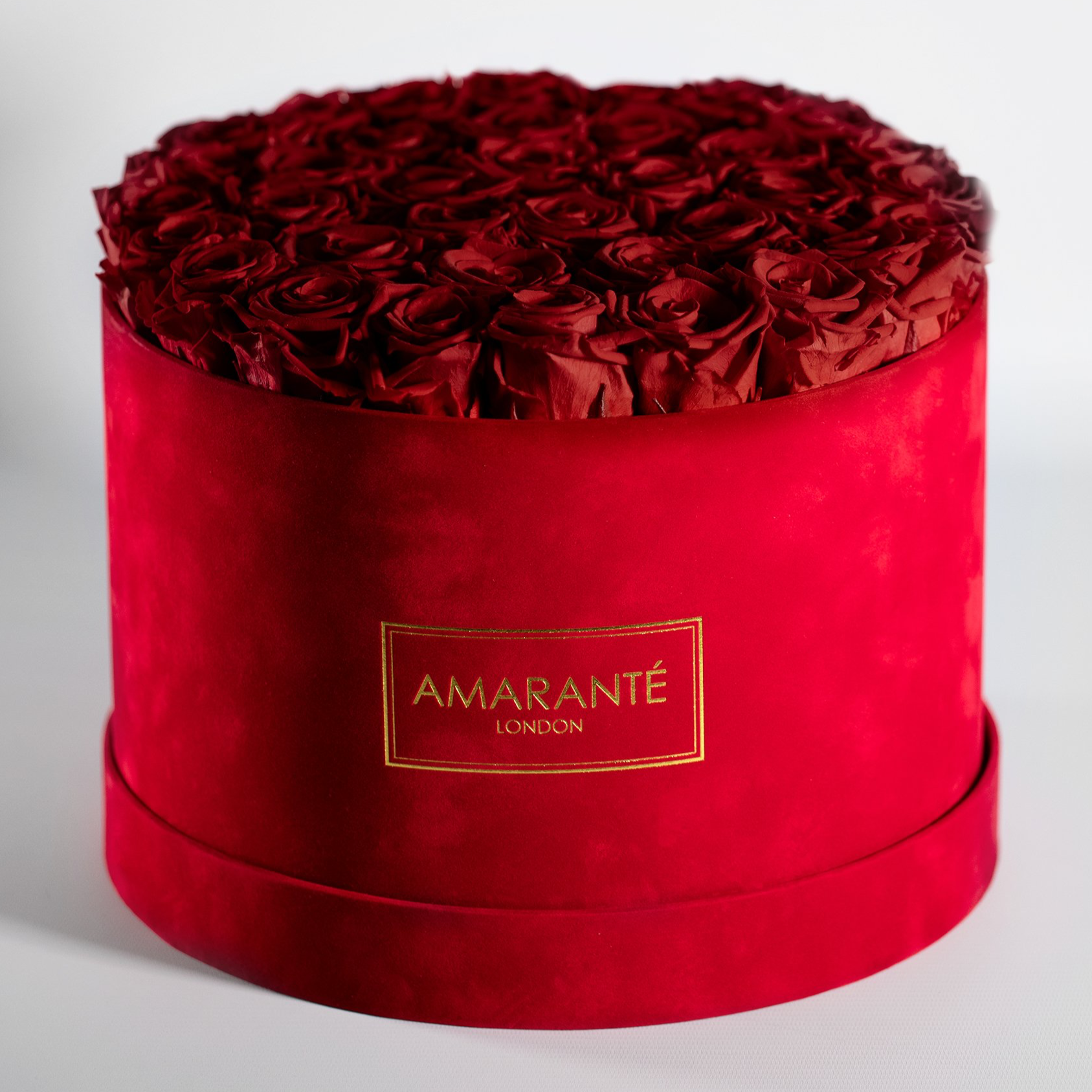 Divine Red Roses in an eye catching red circular box in extra large size. 