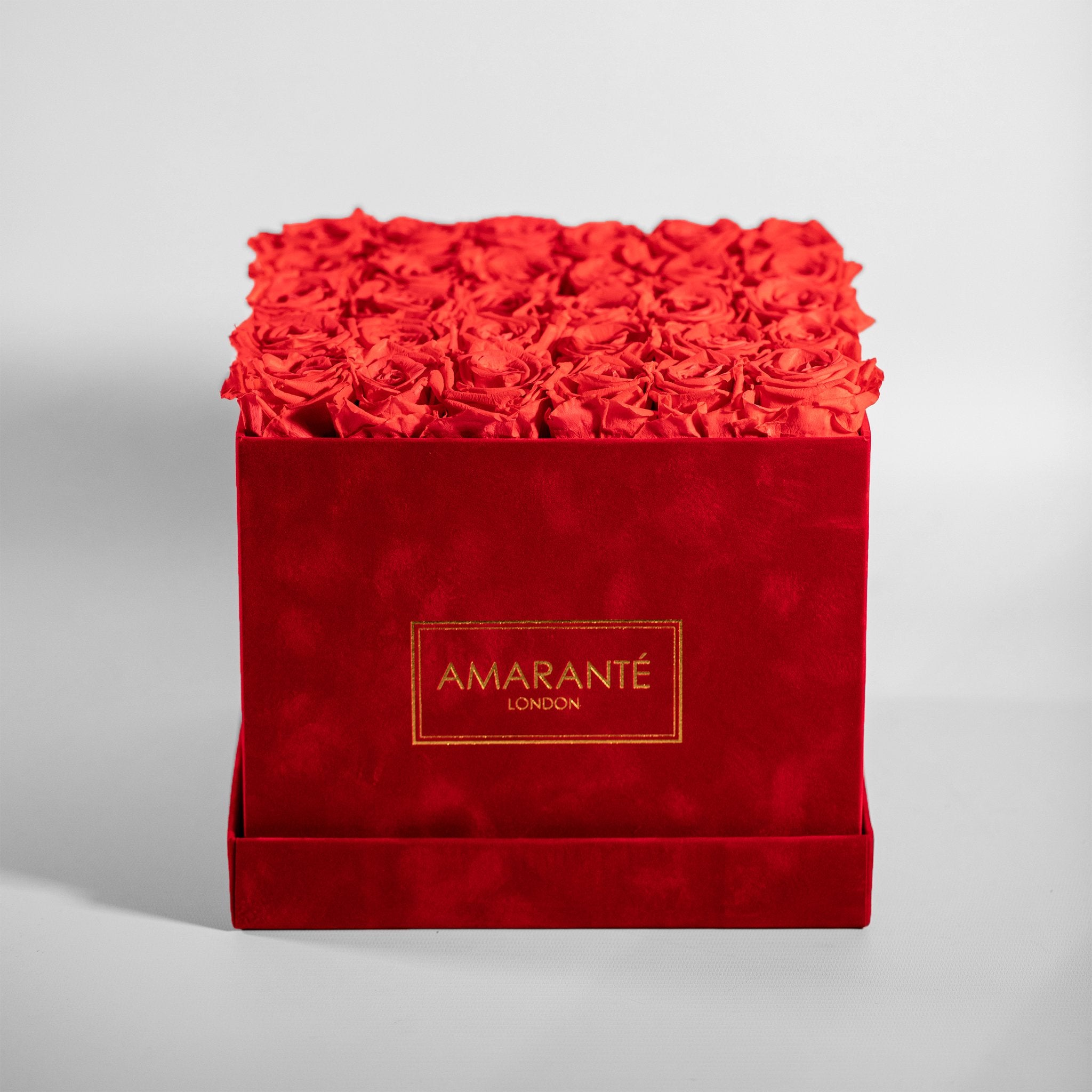 Elegant hot pink coloured Roses connoting love and beauty, featured in a large red box 